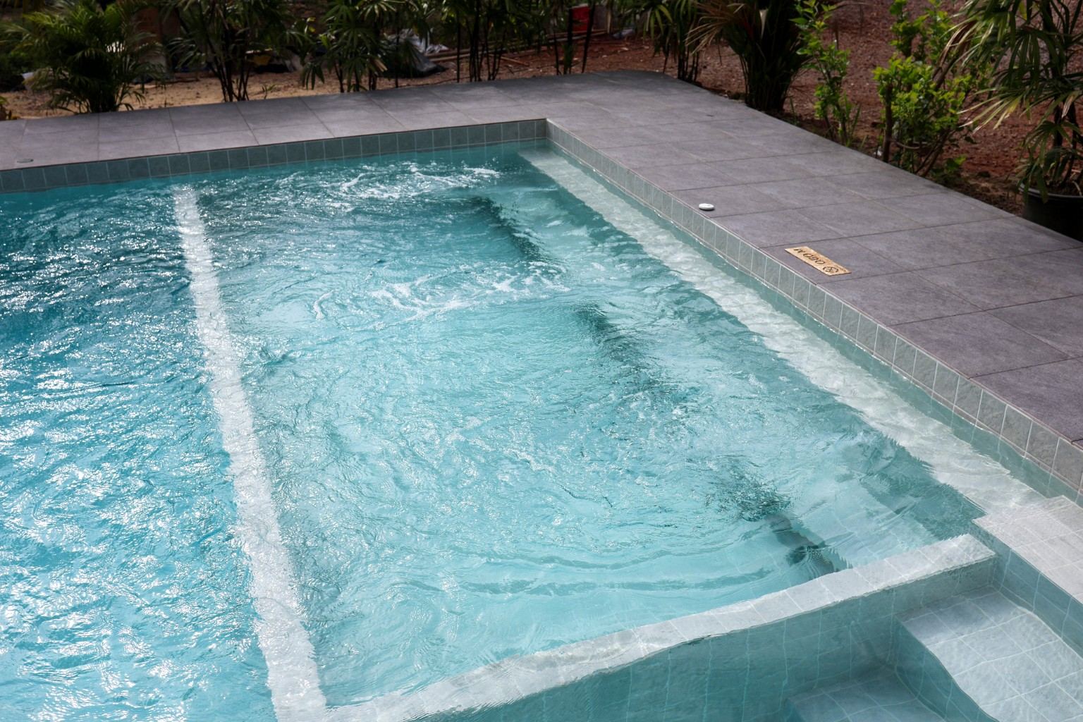 Shallow pool area with water jets